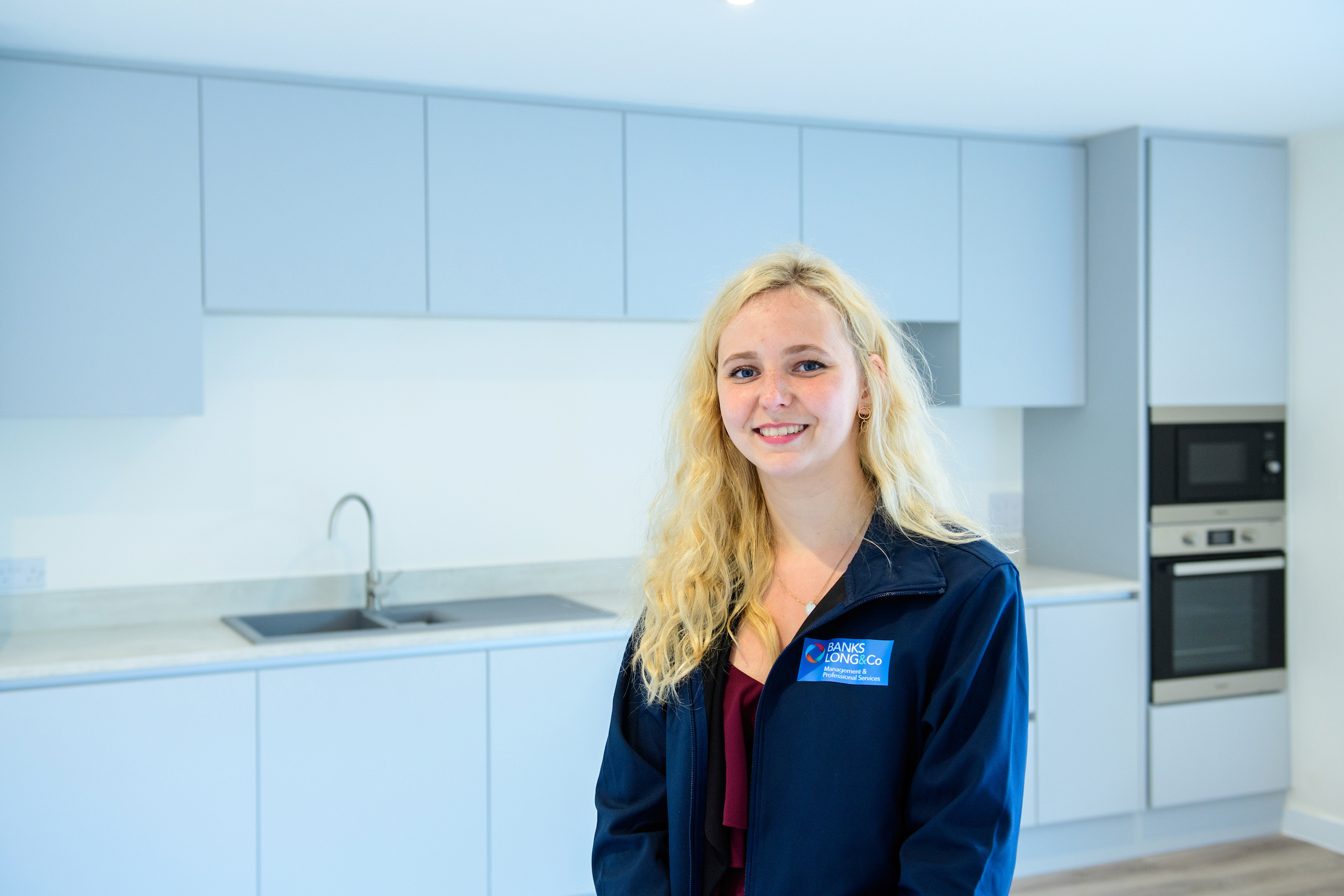Person stood in kitchen
