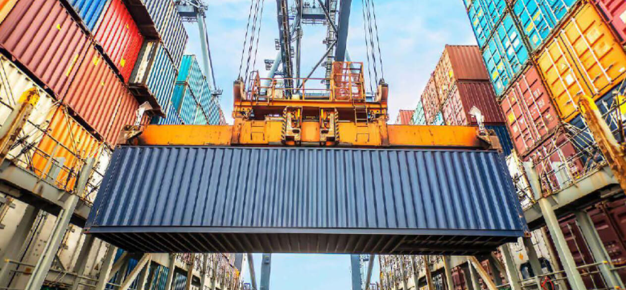 Shipping containers being moved