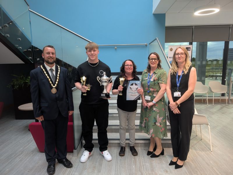 Photo of five students and staff from Skegness College with their awards.